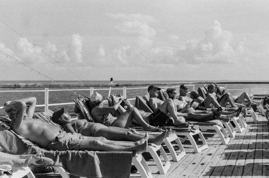 Sun beds in high demand on a day at sea